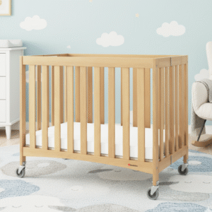 Maples Travel Sleeper Wooden Compact Crib with Mattress – Natural Wood - Foundations USA - Image 1