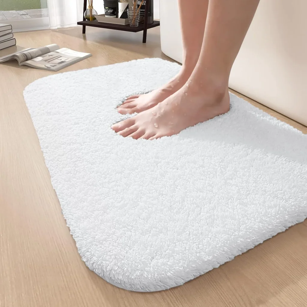 Plush hotel bath rug for safety and comfort in guest bathrooms