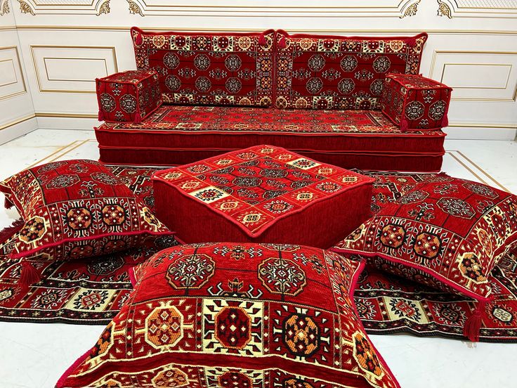 Traditional Arabic seating set with cushions and low tables – Dubai luxury furniture style.